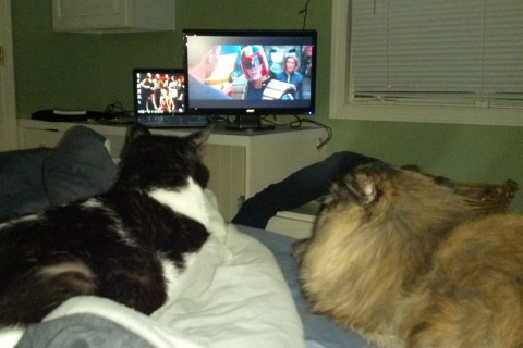 Watching Judge Dredd with his sister, Penny.